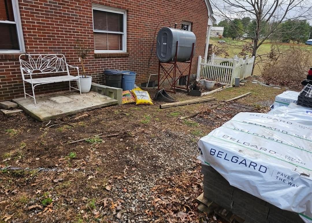 From Bare Dirt to a Paver Patio and Full Landscape Overhaul image